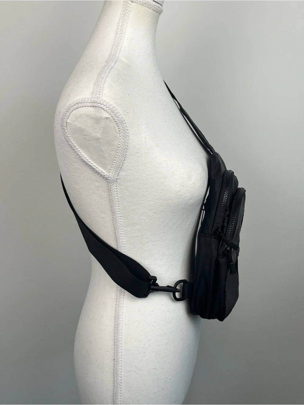 Gogo black nylon convertible strap mini crossbody sling bag.